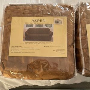 Sofa covers, golden color, fits:78” to 96” 1 cover, new, in their package.